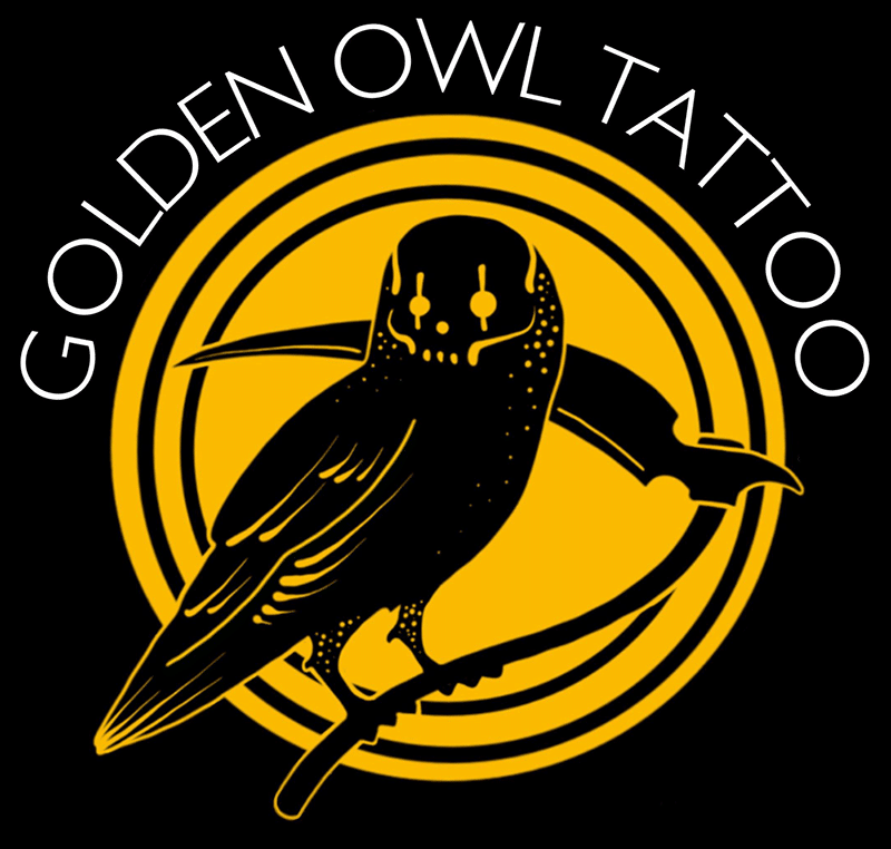 Logo for Golden Owl Tattoo in Napa, CA | The logo is Yellow circle with black outline of an Owl Reaper
